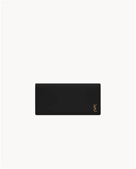 ysl tiny cassandre flat wallet in grained leather|Saint Laurent.